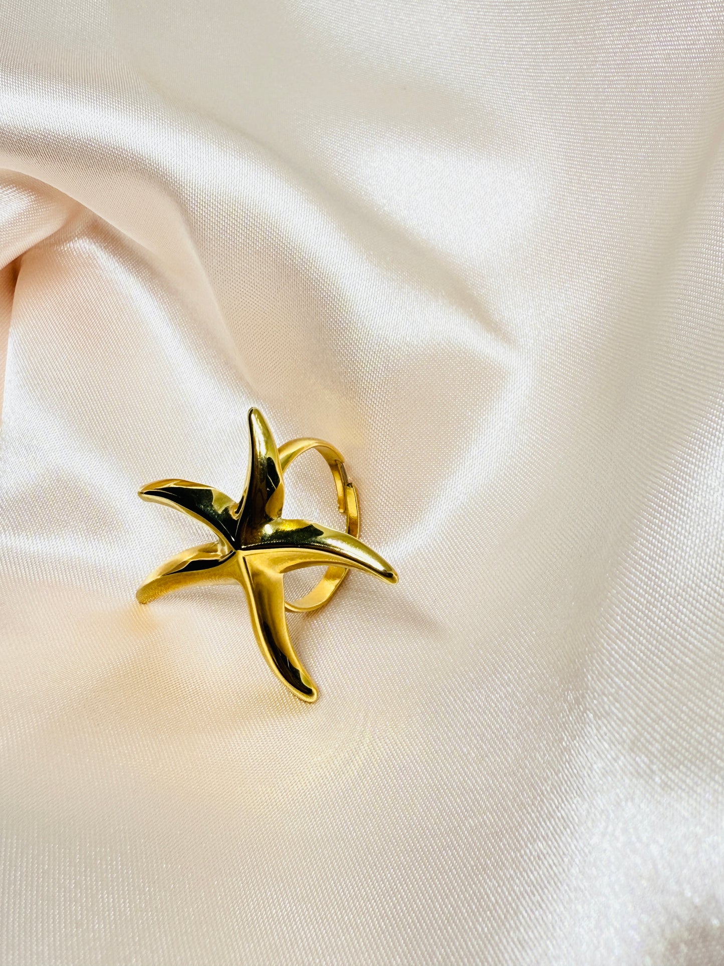 Gold starfish-shaped ring