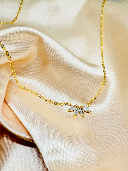 Gold necklace with a star-shaped pendant