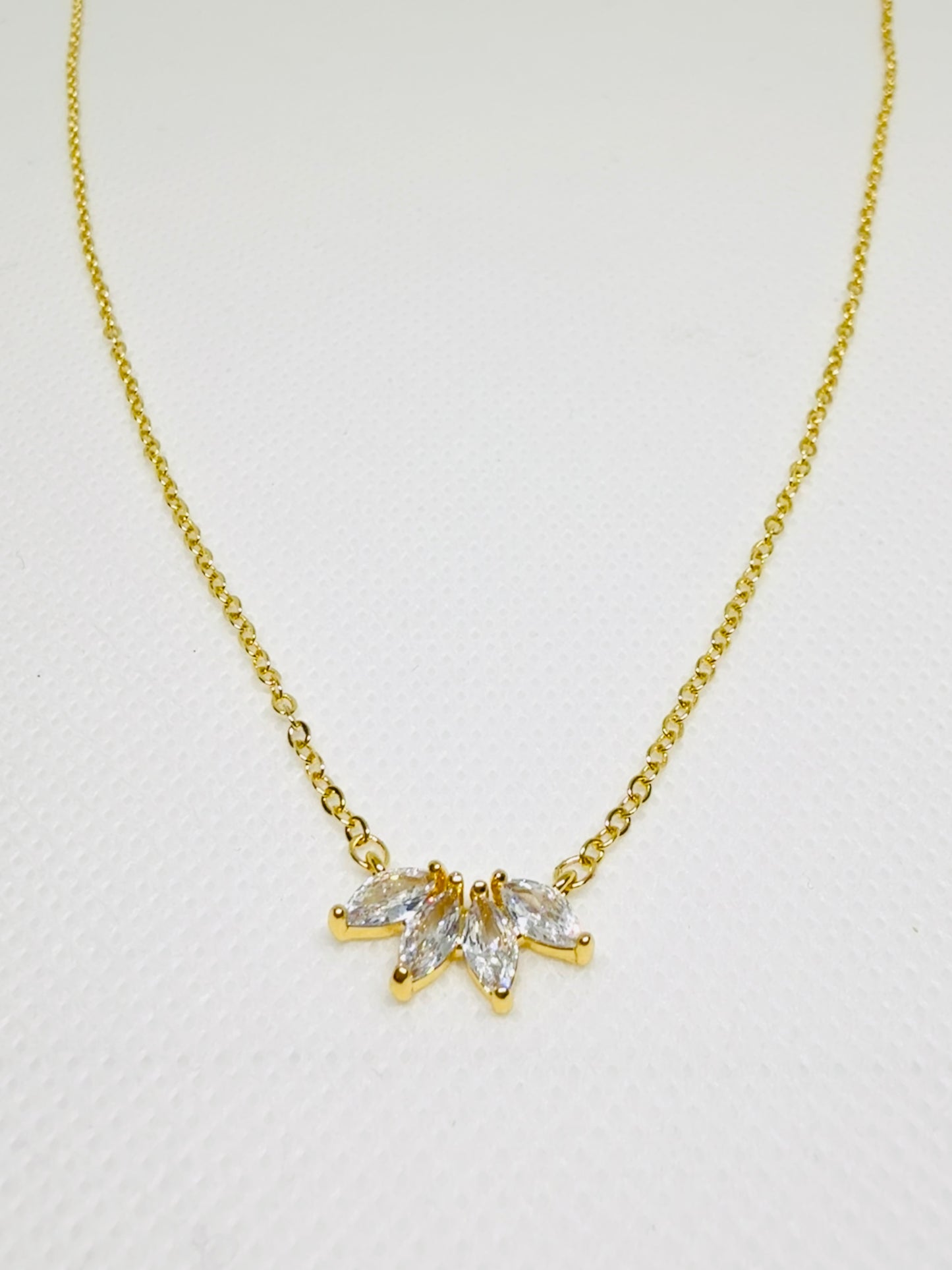 Gold necklace with a star-shaped pendant