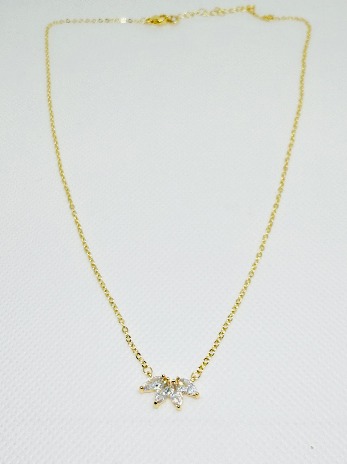 Gold necklace with a star-shaped pendant
