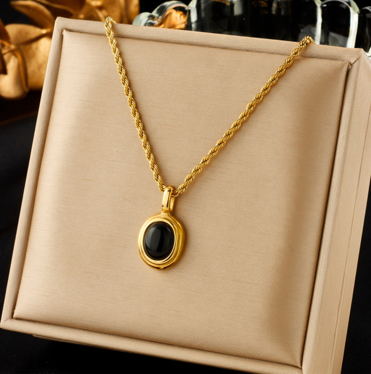 Mini black gallstone pendant