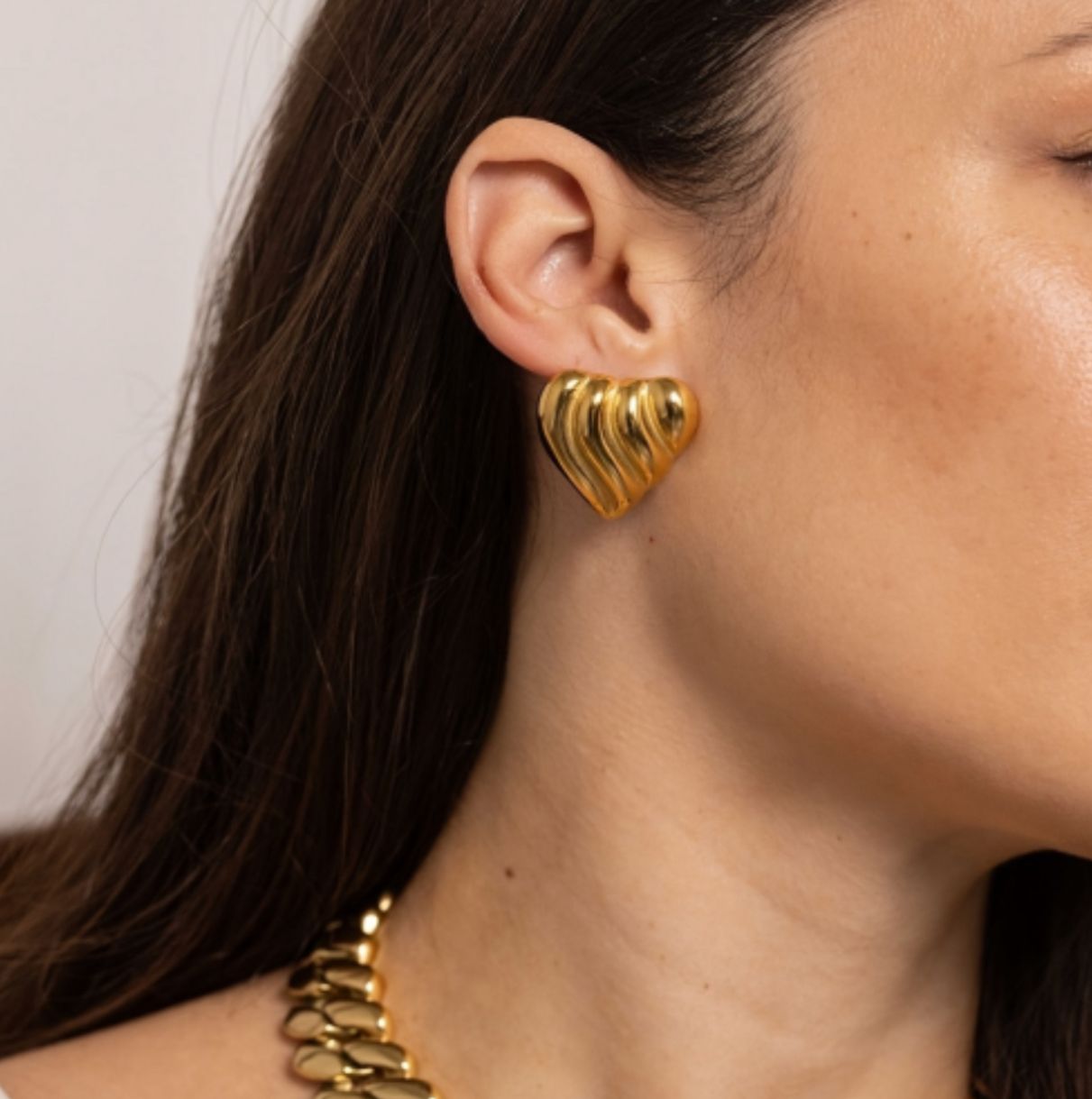 Wavy heart shaped studs